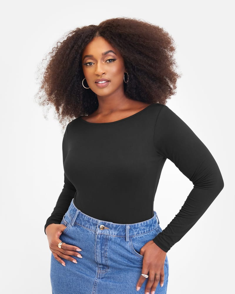 Side of a model wearing a size 5X Essential Boat Neck Long Sleeve Bodysuit in Black by Rebdolls. | dia_product_style_image_id:321274
